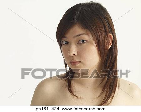 Picture - Close-up of a woman with brown hair. Fotosearch