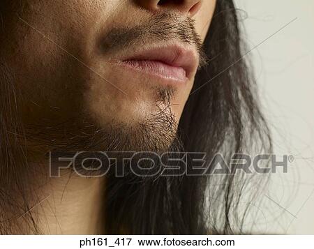 Close-up of man's face View Large Photo Image Stock Photo - Close-up of man's face. Fotosearch