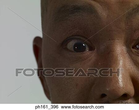 Stock Photograph - Close-up of man's face. Fotosearch