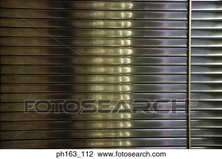 Close-up of metallic case View Large Photo Image Stock Image - Close-up of metallic case. Fotosearch