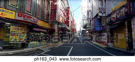 Stock Image - Closed shop fronts on street of Japan. Fotosearch