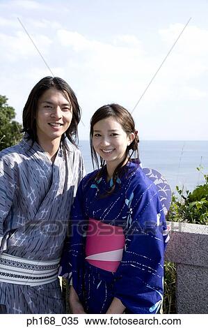 Couple in traditional Japanese clothing View Large Photo Image Stock Photography - Couple in traditional Japanese clothing. Fotosearch