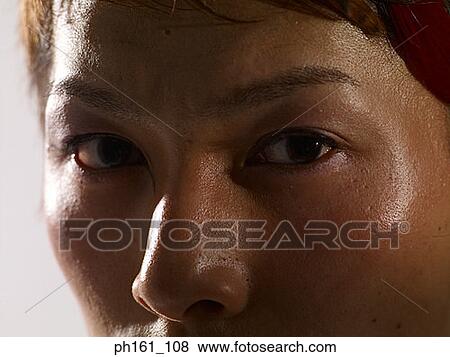 Stock Photo - Face of a man, close-up. Fotosearch