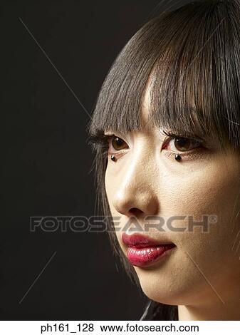 Face of a woman, close-up View Large Photo Image Stock Photo - Face of a woman, close-up. Fotosearch