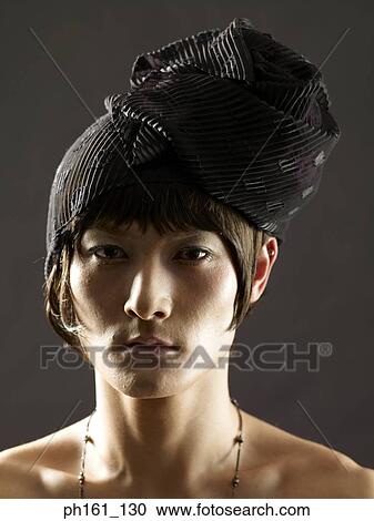 Man wearing a funny hat View Large Photo Image Stock Image - Man wearing a funny hat. Fotosearch