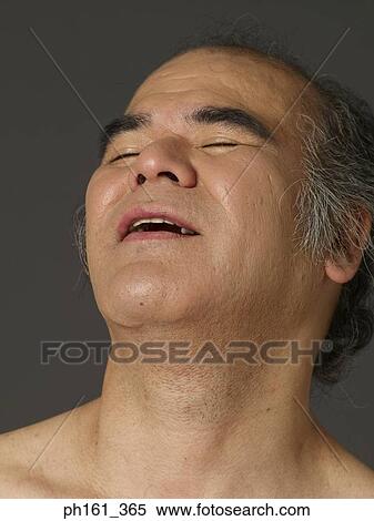 Mature man laughing with eyes closed, head thrown back View Large Photo Image Stock Photography - Mature man laughing with eyes closed, head thrown back. Fotosearch