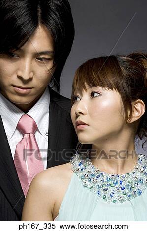 Portrait of a couple in formal attire View Large Photo Image Stock Photography - Portrait of a couple in formal attire. Fotosearch