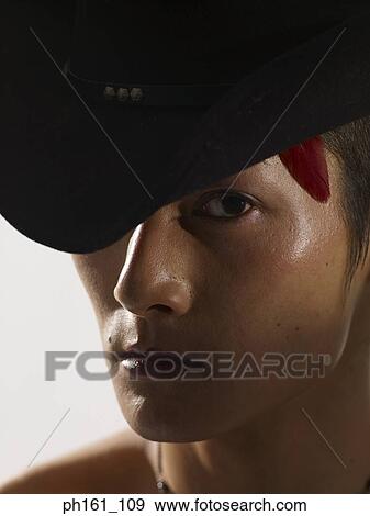 Portrait of a man wearing hat, close-up View Large Photo Image Stock Photo - Portrait of a man wearing hat, close-up. Fotosearch