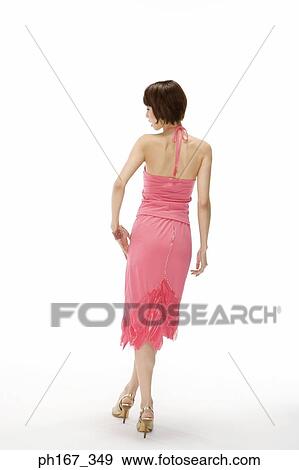Portrait of a well-dressed woman, rear view View Large Photo Image Stock Photo - Portrait of a well-dressed woman, rear view. Fotosearch
