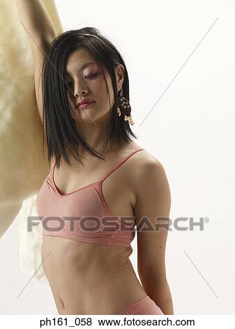 Stock Photo - Portrait of a woman in a bikini. Fotosearch