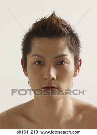Stock Image - Portrait of a young man, close-up. Fotosearch
