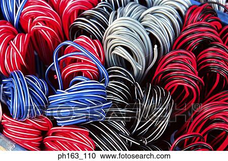 Stock Image - Red, blue and grey wire cords. Fotosearch