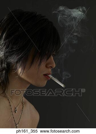 Shirtless young man, smoking View Large Photo Image Stock Photography - Shirtless young man, smoking. Fotosearch