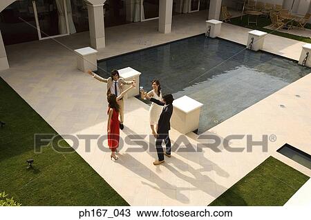 Two couples toasting, high angle View Large Photo Image Stock Image - Two couples toasting, high angle. Fotosearch