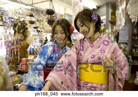 Two women in kimono, shopping View Large Photo Image Stock Photography - Two women in kimono, shopping. Fotosearch