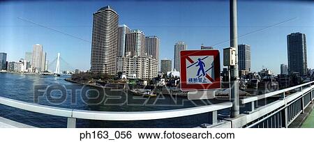 View of a city from sidewalk View Large Photo Image Stock Photograph - View of a city from sidewalk. Fotosearch