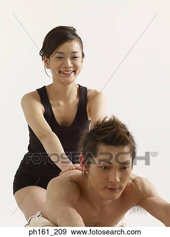 Woman leaning on man's back View Large Photo Image Stock Photo - Woman leaning on man's back. Fotosearch