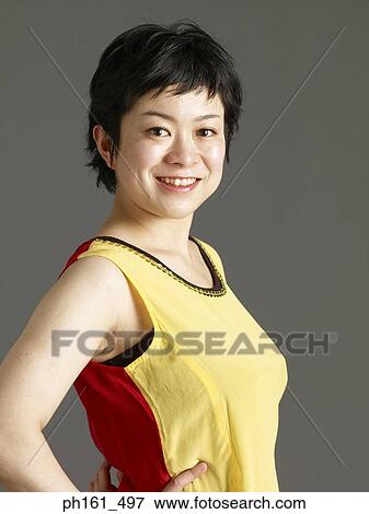 Woman smiling View Large Photo Image Stock Photo - Woman smiling. Fotosearch