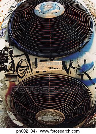 Graffiti on air conditioner compressor View Large Photo Image Stock Photo - Graffiti on air conditioner compressor. Fotosearch