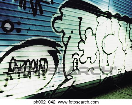Graffiti on shutter View Large Photo Image Stock Image - Graffiti on shutter. Fotosearch