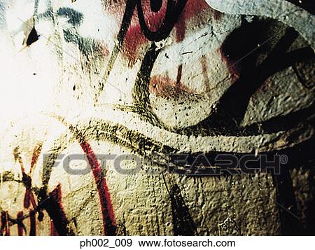 Graffiti on wall View Large Photo Image Stock Photo - Graffiti on wall. Fotosearch