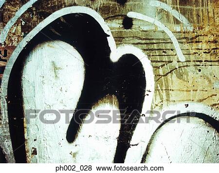 Graffiti on wall View Large Photo Image Stock Photo - Graffiti on wall. Fotosearch