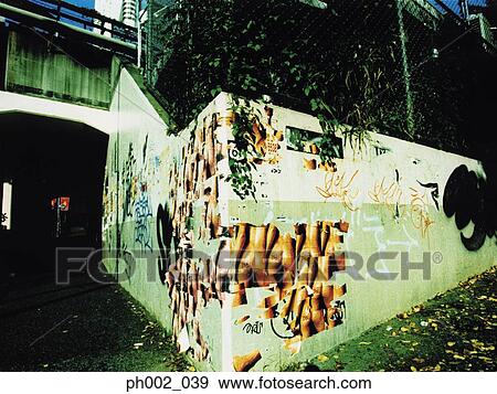 Graffiti on wall View Large Photo Image Stock Photo - Graffiti on wall. Fotosearch