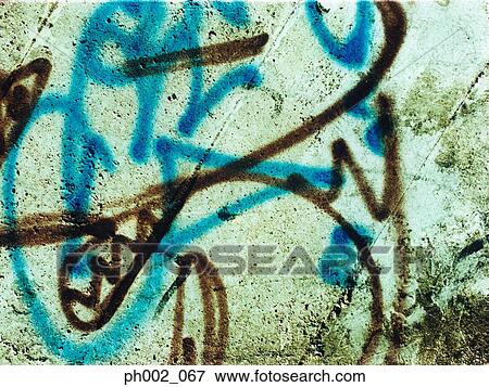 Graffiti on wall View Large Photo Image Stock Photo - Graffiti on wall. Fotosearch