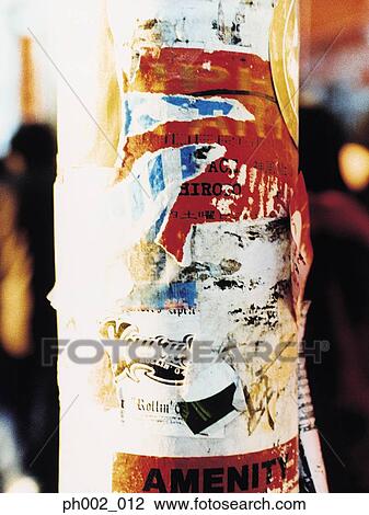 Torn posters on lamp post View Large Photo Image Stock Image - Torn posters on lamp post. Fotosearch