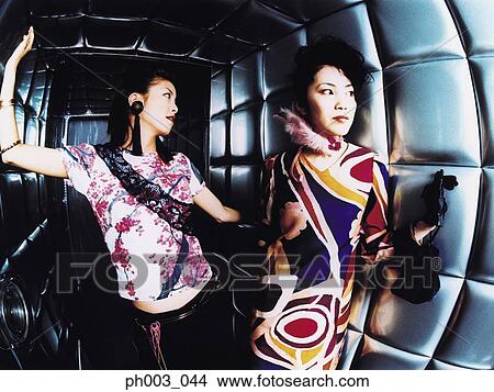 Women in a nightclub, portrait View Large Photo Image Picture - Women in a nightclub, portrait . Fotosearch