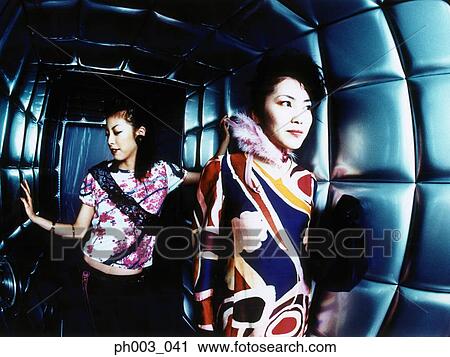 Women in a nightclub, portrait View Large Photo Image Stock Image - Women in a nightclub, portrait . Fotosearch