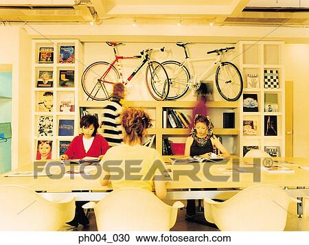 Group of young adults in reading room View Large Photo Image Stock Image - Group of young adults in reading room. Fotosearch