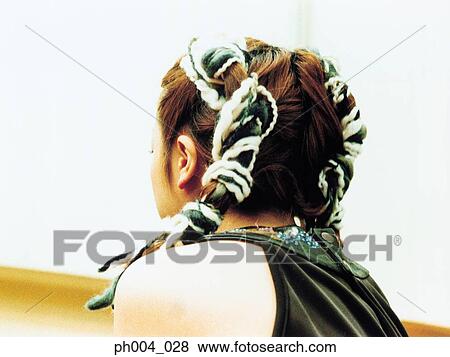 Woman in two plaits, rear view View Large Photo Image Stock Photo - Woman in two plaits, rear view. Fotosearch