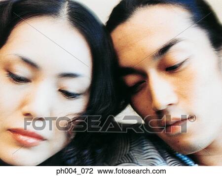 Stock Image - Young couple, portrait, close up. Fotosearch