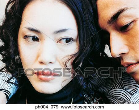 Stock Photo - Young couple, portrait, close up. Fotosearch
