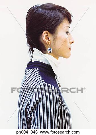 Young woman, profile, close up View Large Photo Image Stock Image - Young woman, profile, close up. Fotosearch