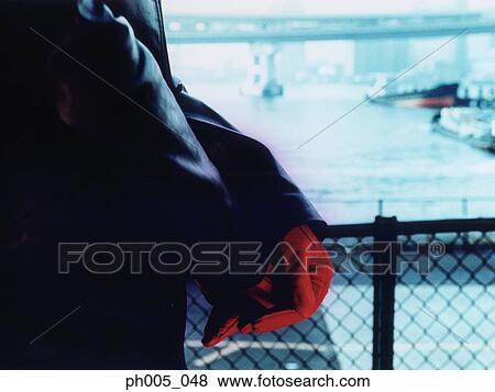 Woman leaning on fence, close up View Large Photo Image Stock Photo - Woman leaning on fence, close up. Fotosearch