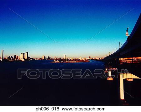 Japan, Tokyo Bay skyline at dusk View Large Photo Image Stock Photo - Japan, Tokyo Bay skyline at dusk. Fotosearch