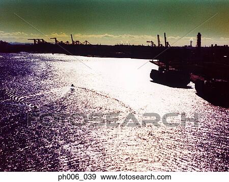 Silhouetted harbor at sunset, Tokyo Bay, Japan View Large Photo Image Stock Photo - Silhouetted harbor at sunset, Tokyo Bay, Japan. Fotosearch