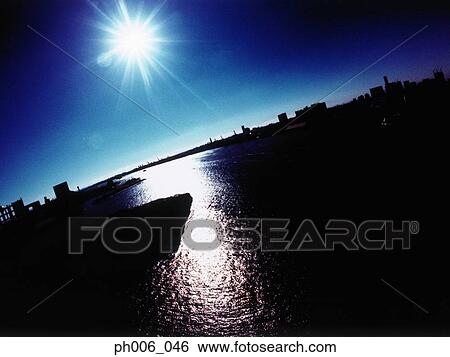 Silhouetted Tokyo Bay, Japan at sunset View Large Photo Image Stock Photograph - Silhouetted Tokyo Bay, Japan at sunset. Fotosearch