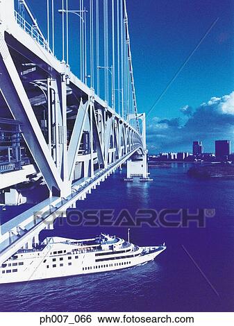 Cruise ship going under Rainbow Bridge View Large Photo Image Stock Photograph - Cruise ship going under Rainbow Bridge. Fotosearch