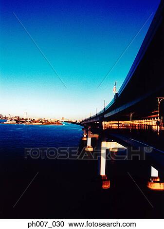Rainbow Bridge at sunset, Tokyo Bay, Tokyo, Japan View Large Photo Image Stock Image - Rainbow Bridge at sunset, Tokyo Bay, Tokyo, Japan. Fotosearch