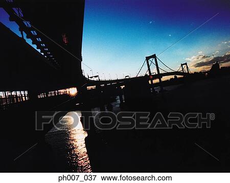 Rainbow Bridge at sunset, Tokyo Bay, Tokyo, Japan View Large Photo Image Stock Photo - Rainbow Bridge at sunset, Tokyo Bay, Tokyo, Japan. Fotosearch