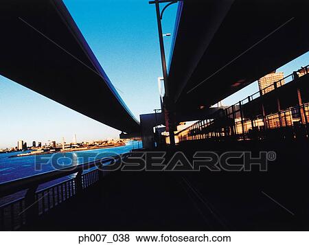 Rainbow Bridge at sunset, Tokyo Bay, Tokyo, Japan View Large Photo Image Stock Photo - Rainbow Bridge at sunset, Tokyo Bay, Tokyo, Japan. Fotosearch
