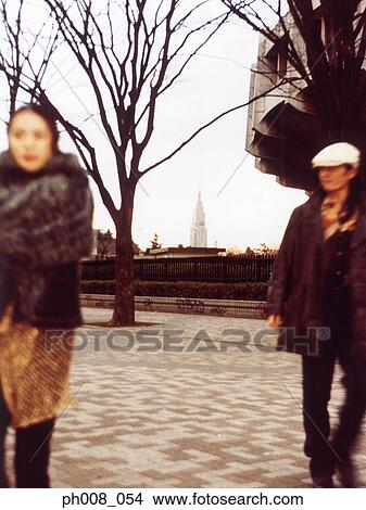 Picture - Couple walking in a park. Fotosearch