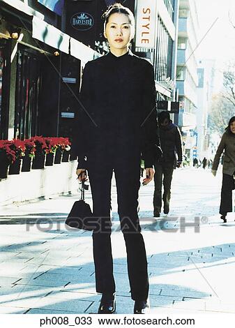 Stock Image - Portrait of a modern Asian woman. Fotosearch