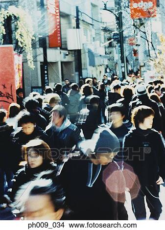 Picture - Crowd of people walking in Tokyo street. Fotosearch