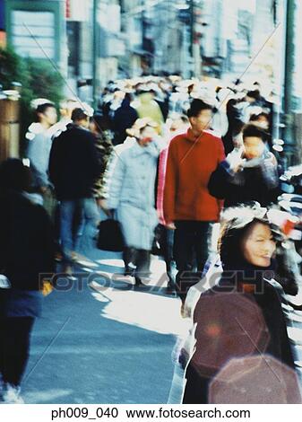 Crowd of people walking in Tokyo street View Large Photo Image Stock Image - Crowd of people walking in Tokyo street. Fotosearch