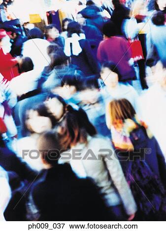 Crowd of people walking in Tokyo street View Large Photo Image Stock Photo - Crowd of people walking in Tokyo street. Fotosearch