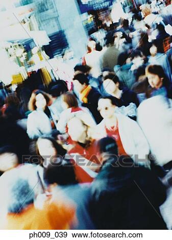 Crowd of people walking in Tokyo street View Large Photo Image Stock Photo - Crowd of people walking in Tokyo street. Fotosearch